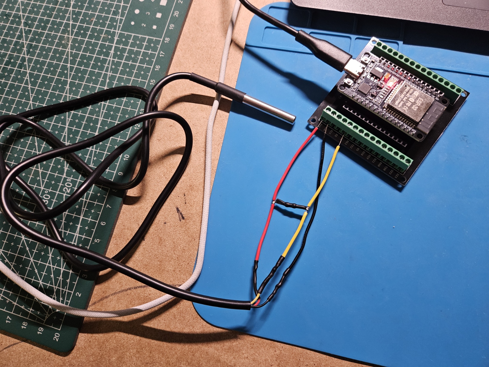 Photo of DS18B20 wired to the ESP32 development board showing the pull-up resistor placement